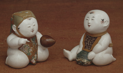 Small Boy Riding a Turtle; Gosho Dolls Image