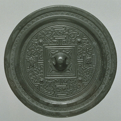 Mirror with TLV Pattern, Four Protuberances, and Characters for "Blue Horses Image