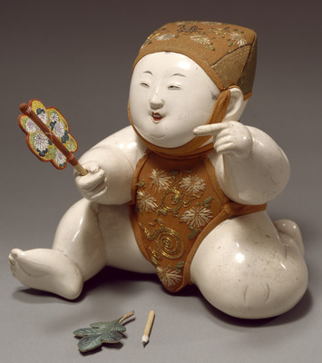 Boy Wearing Cap with the Character for "Longevity"; Gosho Doll Image