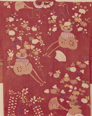 Uchikake (Formal Outer Robe) with Peonies, Chrysanthemums, Plum Blossoms, Wisteria, Flower Carts, and Cypress Fans in "Fawn Spot" Dyeing and Embroidery on Red Figured-Satin Ground Image