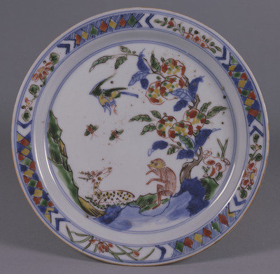 Jingdezhen Plate with the Peach Tree of Immortality, Deer, and Monkey in Underglaze Blue and Overglaze Enamels Image