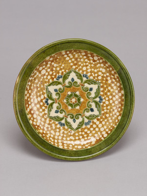 Three-Footed Dish with a Stylized Flower Image