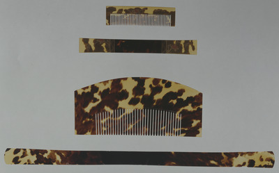 Comb and Ornamental Hairpin with Flowering Plants in Makie on Tortoise Shell Image