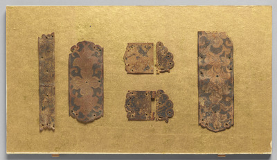 Leather Fragments in the Shape of Metal Fittings, with Buddhist Flowers Image