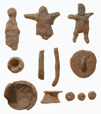 Human- and Mirror-shaped Ritual Objects Image